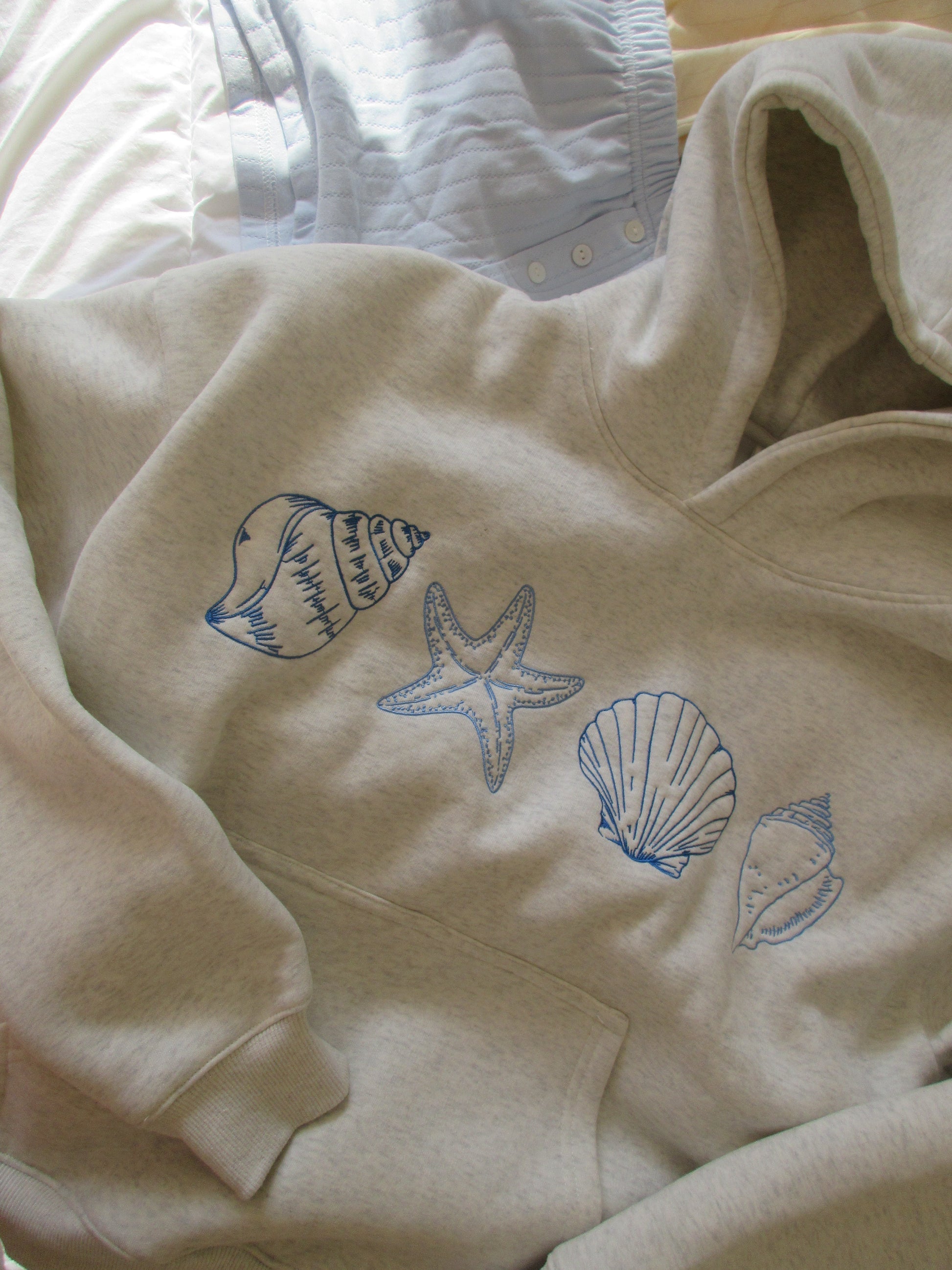 Ocenia | Unisex-Sweatshirt z muszelkami